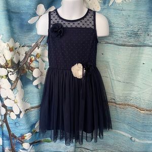 Little girls dress, navy blue with lace and flower detail. Size 4T